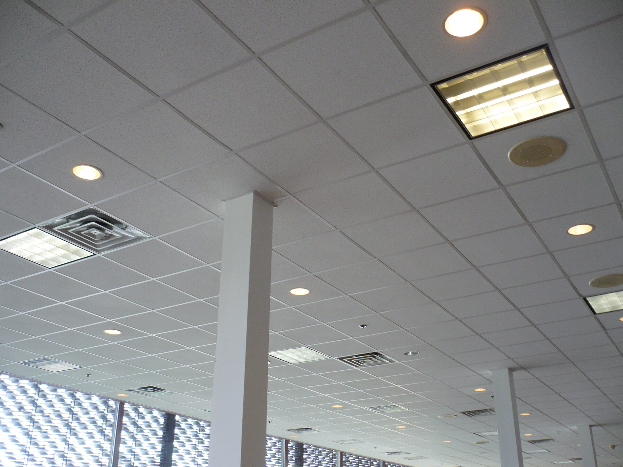 Commercial suspended ceiling with lighting and HVAC fixtures